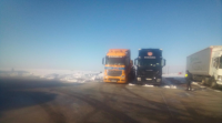 Centos de camións galegos continúan bloqueados polo colapso de Madrid