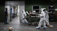 América vacila entre o combate da pandemia e a reapertura económica