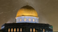 A neve tingue de branco a cidade monumental de Xerusalén