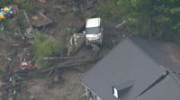 A chuvia torrencial provocou un corremento de terra que sepultou ducias de vivendas no Xapón