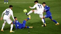 O Real Madrid derrota ao Xetafe, que non presentou oposición (2-0)
